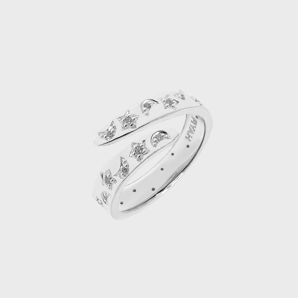 Adjustable silver ring featuring a moon and star, accented with gemstones