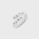 Adjustable silver ring featuring a moon and star, accented with gemstones