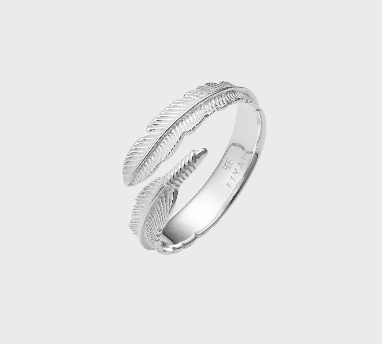 The FIYAH Adjustable Plume Ring. Representing a feather from an angel. Made from Sterling Silver with a Pure Silver Plate.