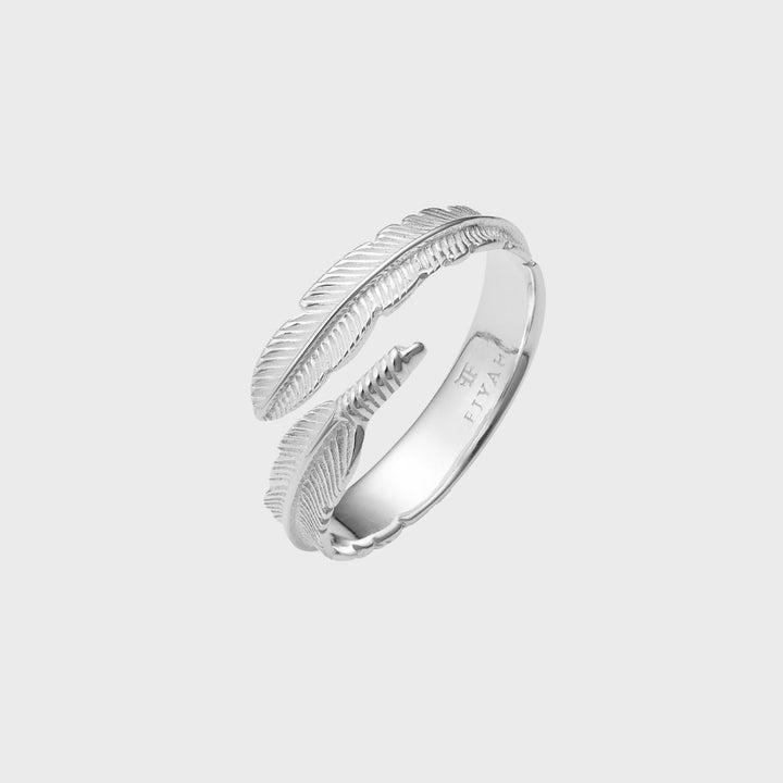 The FIYAH Adjustable Plume Ring. Representing a feather from an angel. Made from Sterling Silver with a Pure Silver Plate.